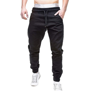 Men Sweatpants Autumn Slacks men pants Polyester Casual Elastic Jogging Sport pants men cotton Solid Baggy Pocket Trousers W621